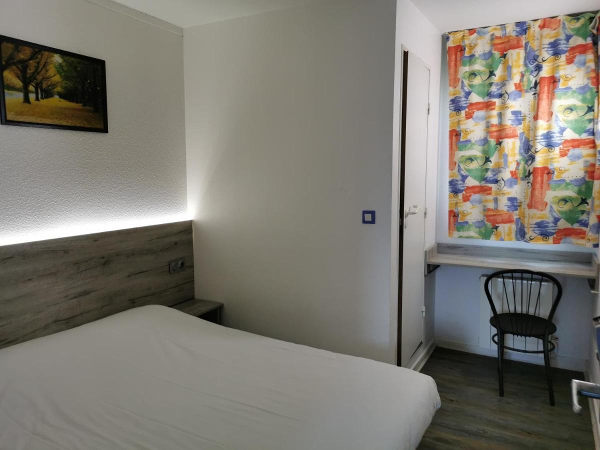 Alpha Hotel Bouafle Bagian luar foto